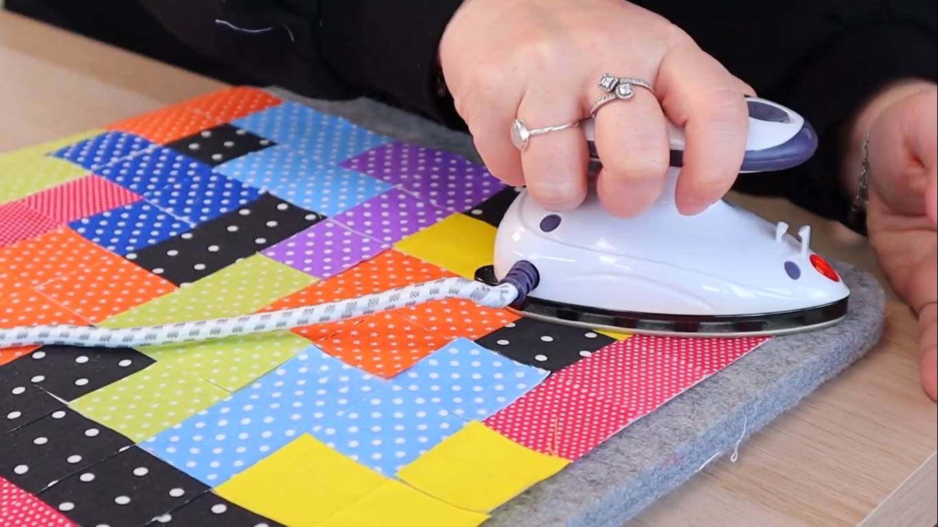 tetris quilt pattern step 6 pressing the squares in place