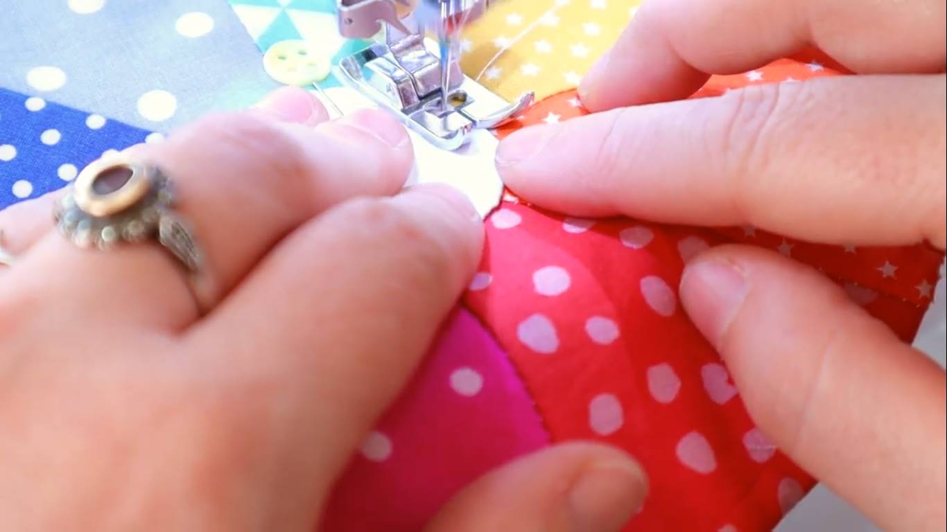 rainbow color wheel quilt block step 16 sewing the center piece