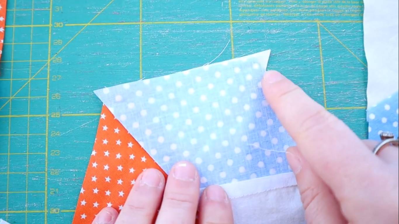 how to make a tumbling quilt block step 9 sew the pieces together into strips